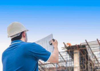 engineer-is-inspecting-his-work-in-building-construction-site