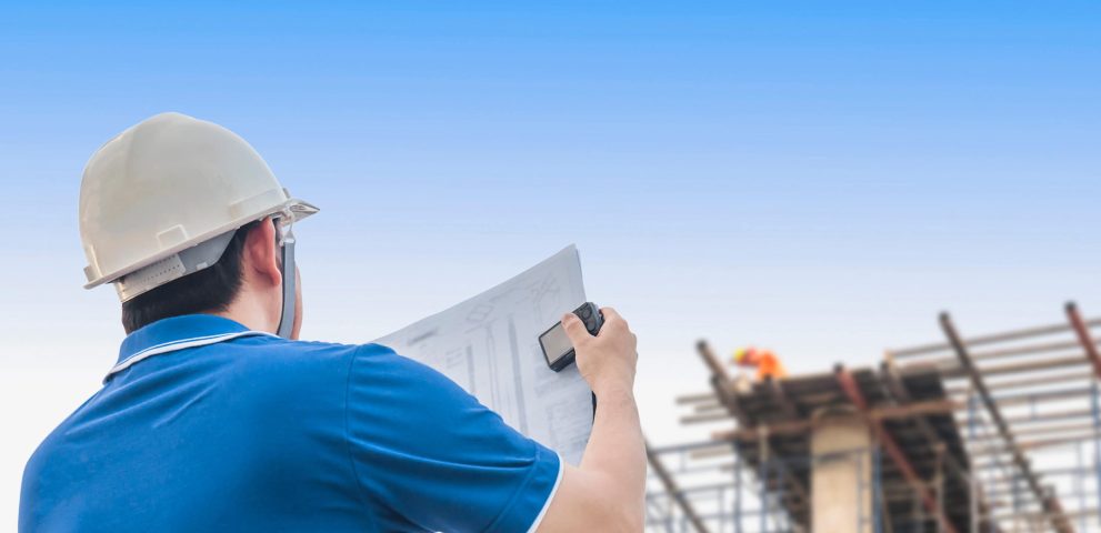 engineer-is-inspecting-his-work-in-building-construction-site